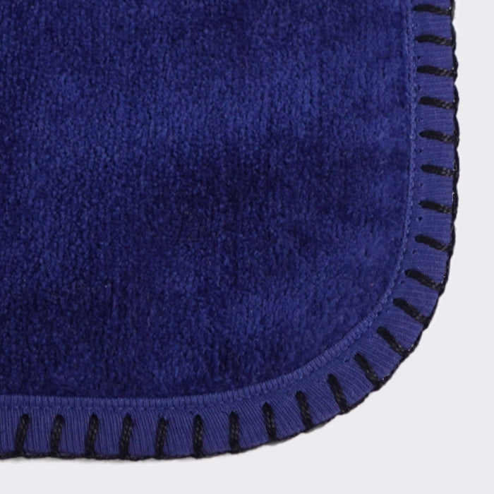 Close up of corner of a towel. Royal Blue towel with Black color edge stiting.