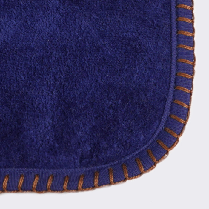 Close up of corner of a towel. Royal Blue towel with Mead color edge stiting.