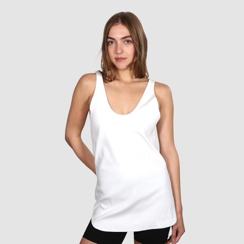 Woman wearing a white nautical themed tank top on a white background