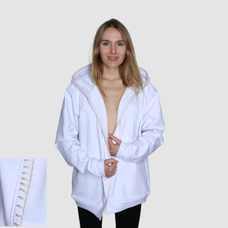 Woman wearing a white nautical themed zip up hoodie on a white background
